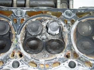 Damaged Cyl Head With Valve.jpg