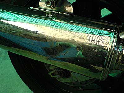 Dent and scratches to can from first drop.  Dents are still there :)