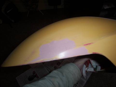 sand it smooth, to get rid of a crack on one side i had to sand through the paint and into the base primer used originally