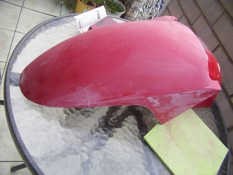 sand the current coating down to remove the &amp;quot;gloss&amp;quot;, this ensures that the filler and the paint will stick.