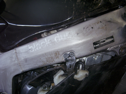 Whoever took him must've put this &amp;quot;Black Duck Valley&amp;quot; sticker on him at some stage, then taken it off. And slapped some gray paint on the frame for some reason.