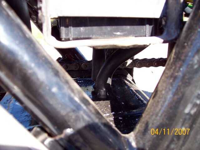 oil catch tank in front of swingarm.