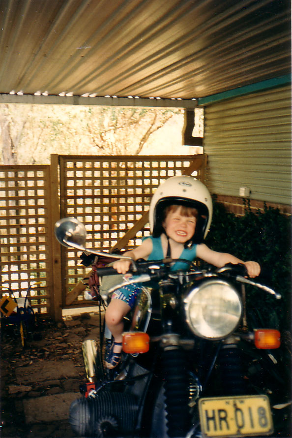sitting on dad's bike.... not the front numberplate before they were legislated out