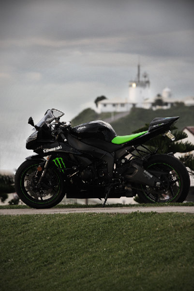 on a hill in front of nobby's lighthouse.  miracle of a long lens makes it appear close