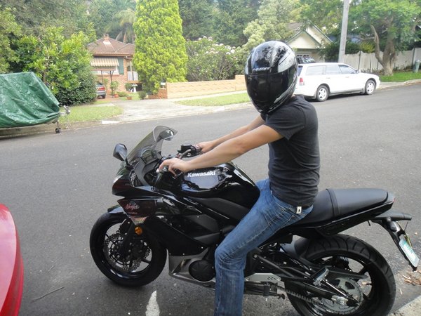 I do have a riding jacket, but in this picture I was just moving the bike from the street to my yard.