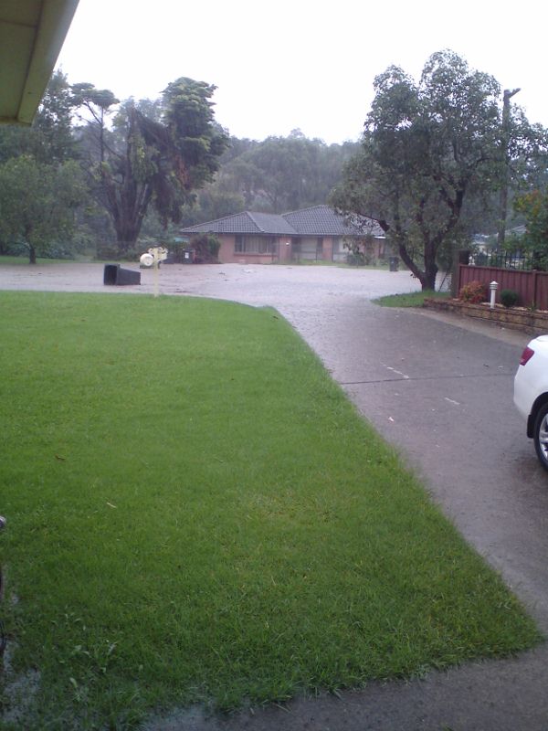 Water flowing down the street.