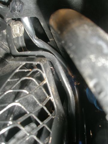 wiring rubbing on fan. Bit hard to see but it is the wire with the blue insulation tape